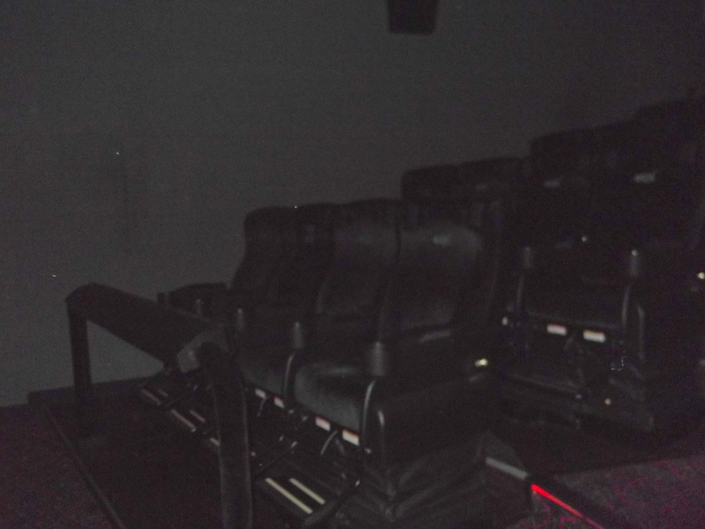 Sit in the movie theatre